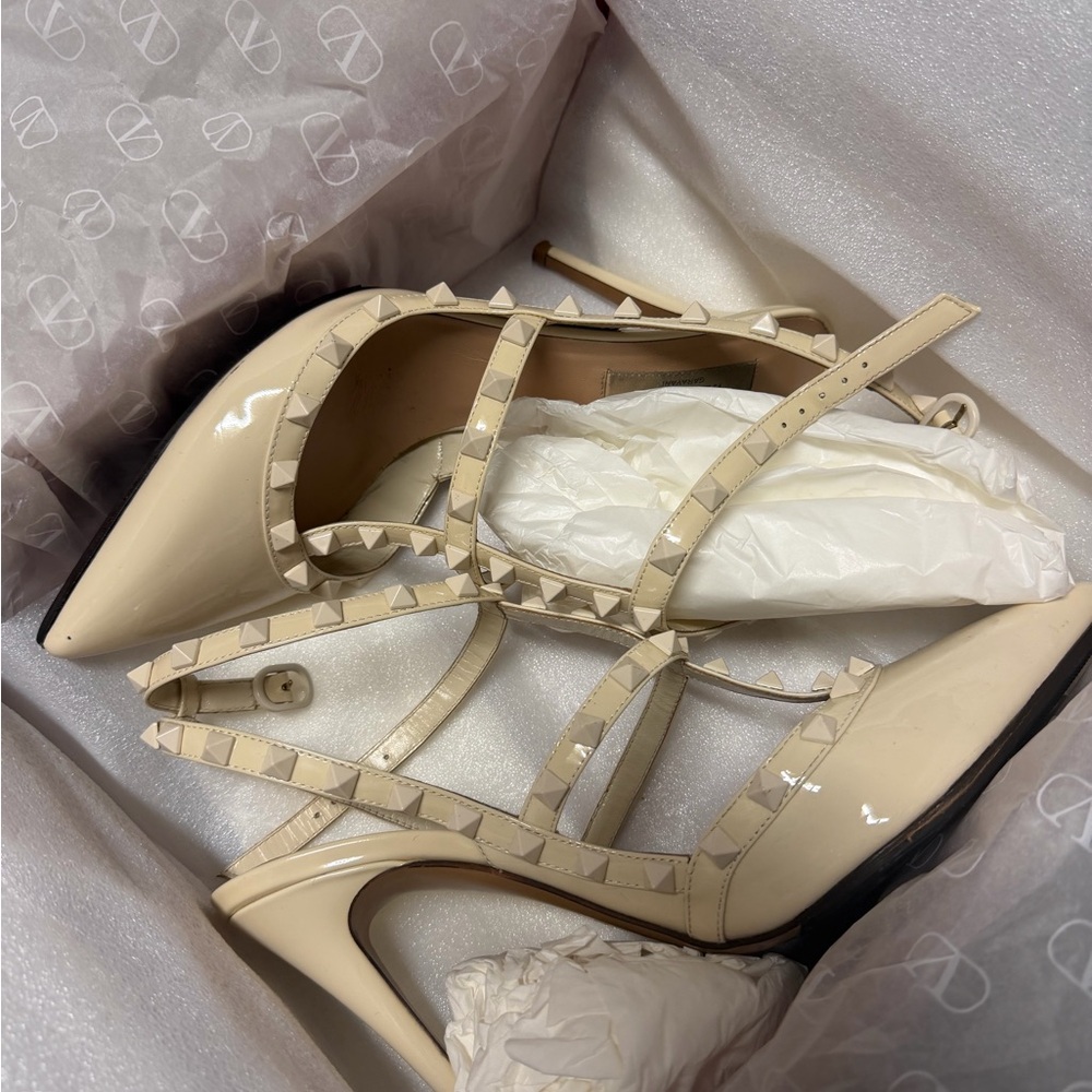 Valentino Garavani Rockstud Patent Leather Pointed-Toe Pumps in Nude Beige